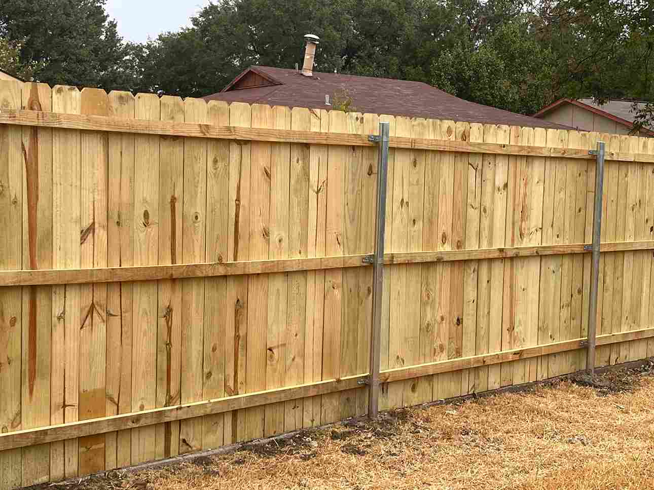 Wood and metal fence